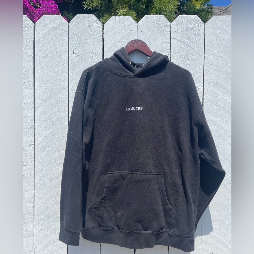 “He Sucks” Black Oversized Hoodie.